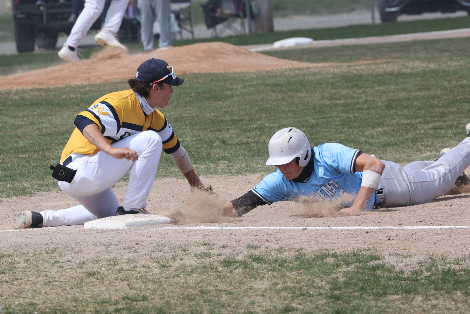 Ashton Ross goes for a tag on a Southeast player.