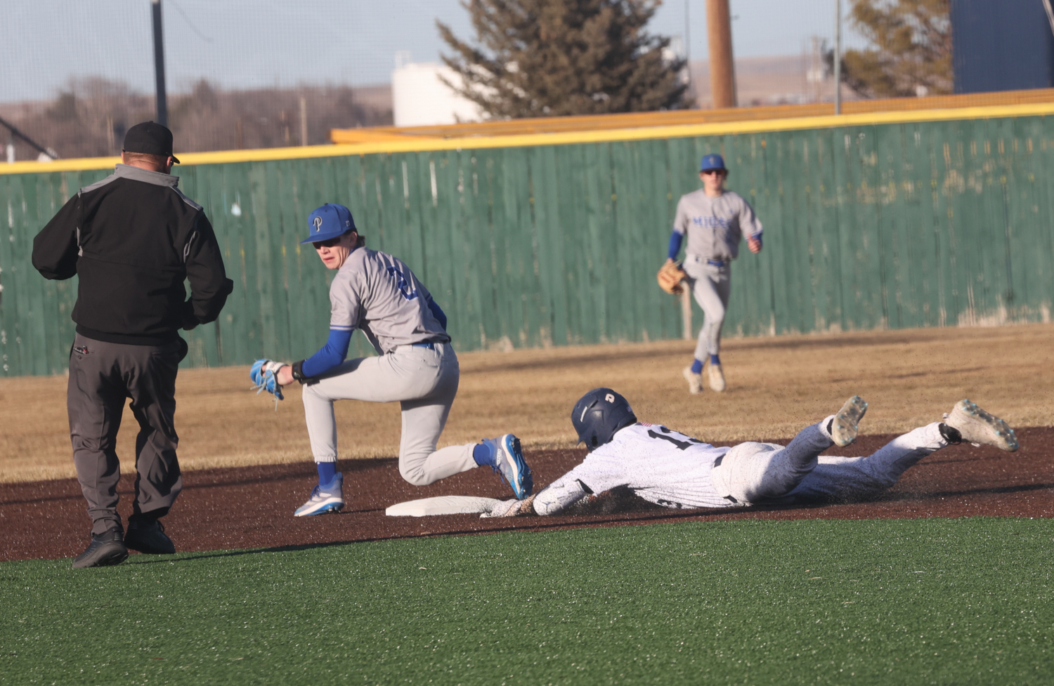 Baseball action in game two with Miles.