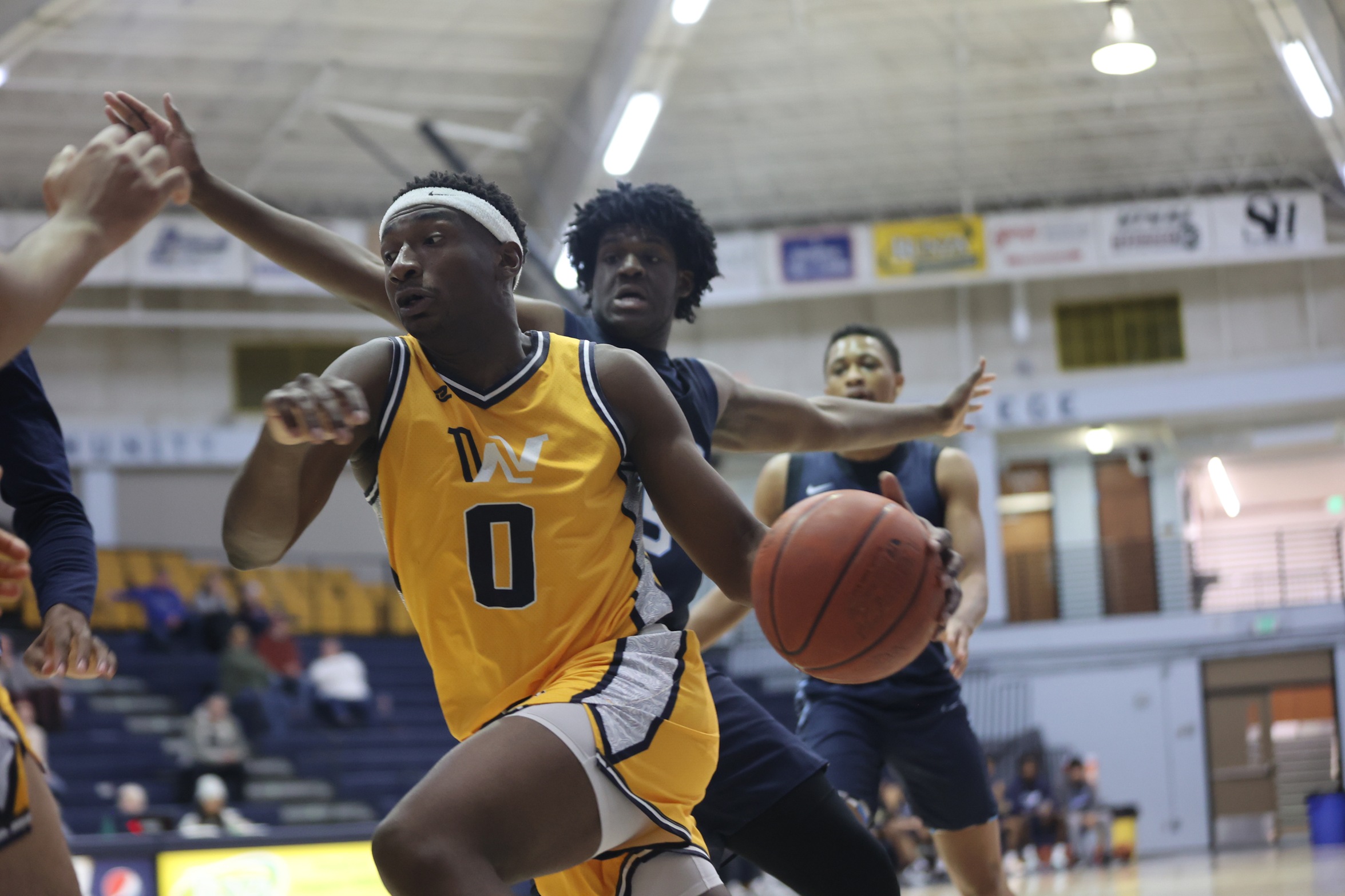 JJ Harris brings the ball up the court.