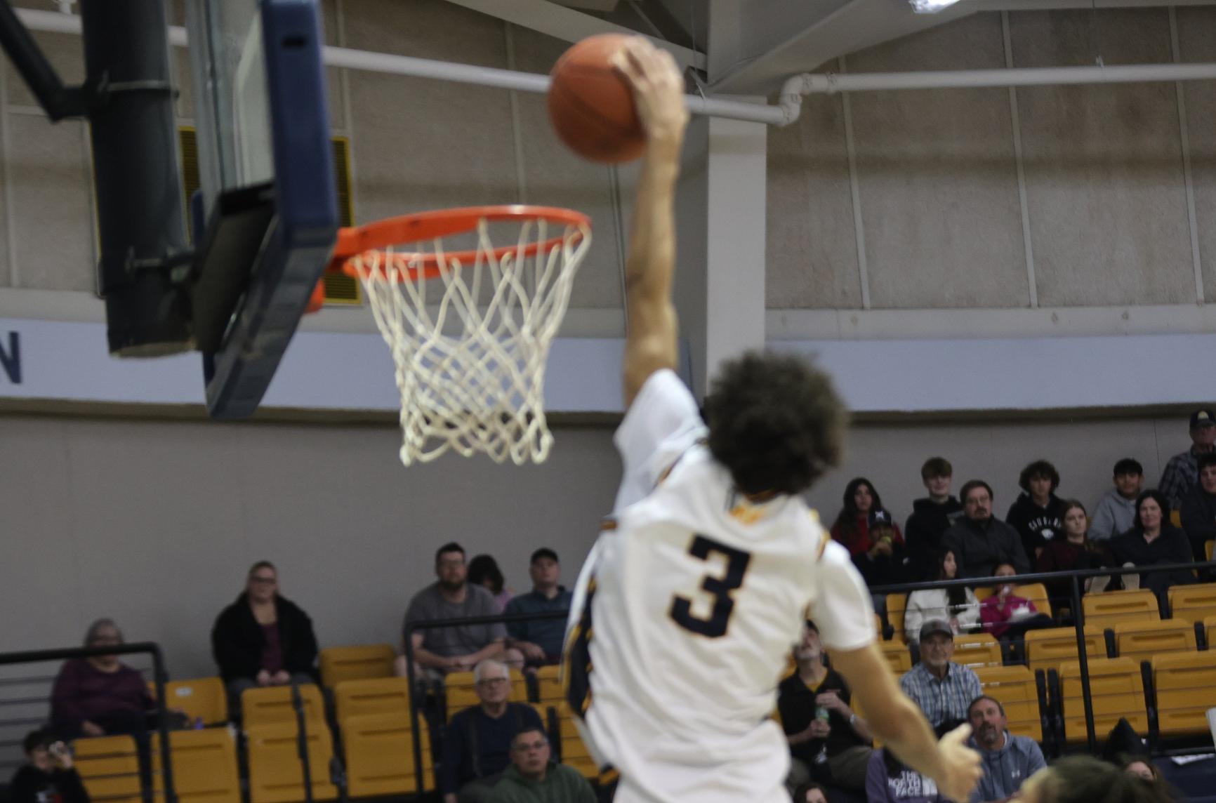 Kellon Harris goes up for a dunk in the second half against Otero.