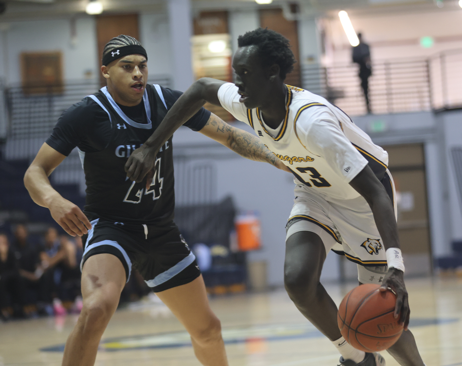 Mathiang Maker drives to the basket against Gillette on Monday.