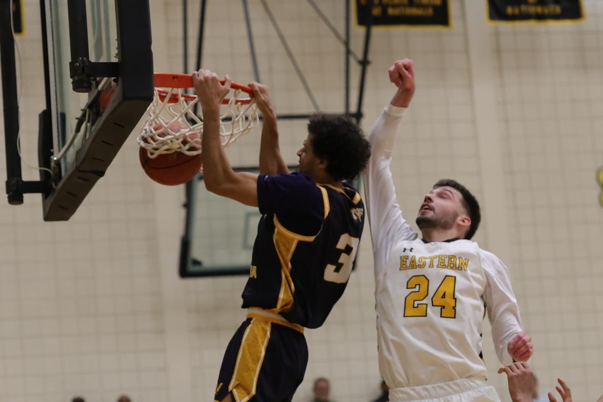 Kellon Harris dunks the ball in the game with EWC.
