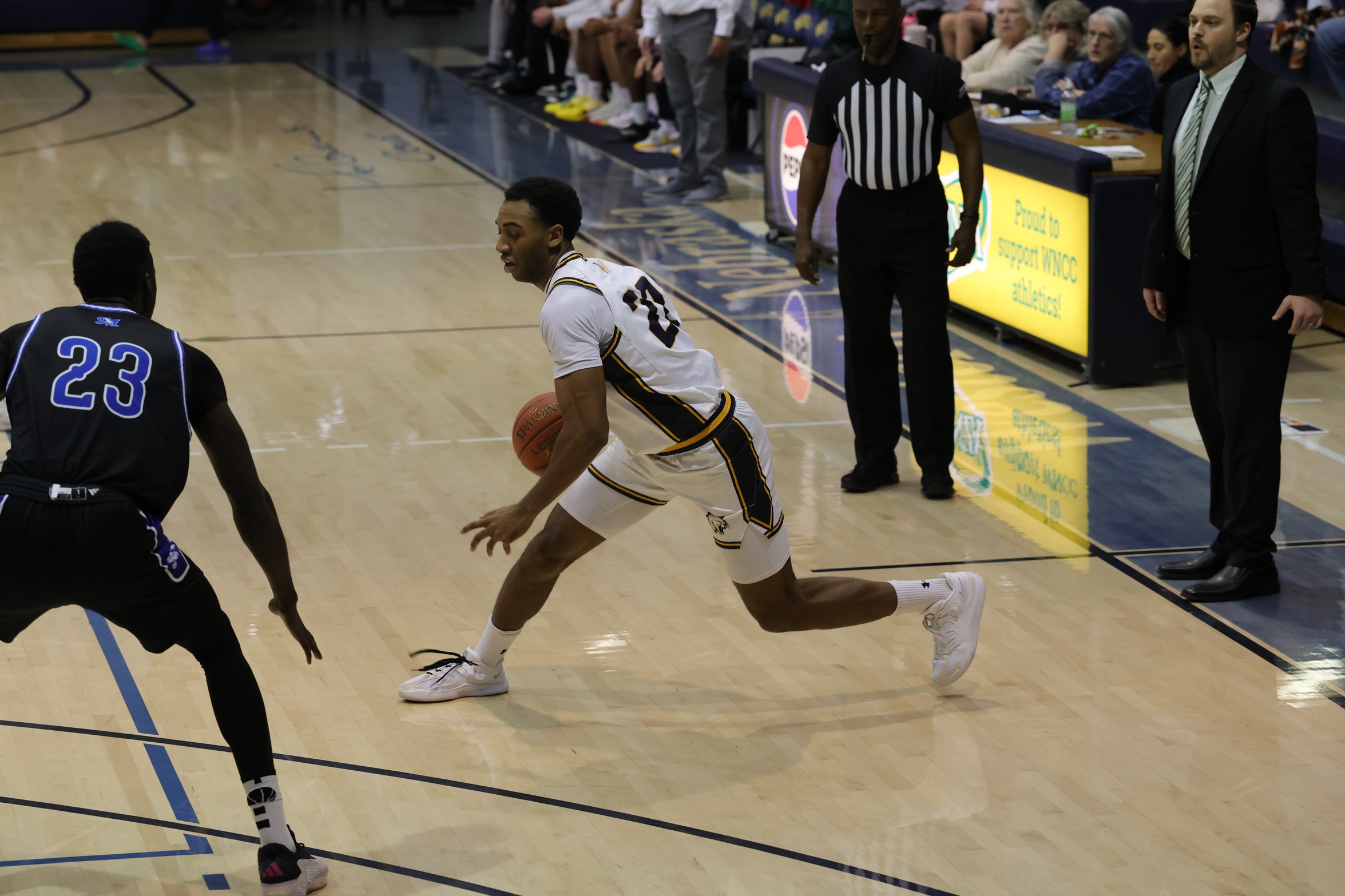 Dorian Nguema drives to the bucket on Wednesday against McCook.