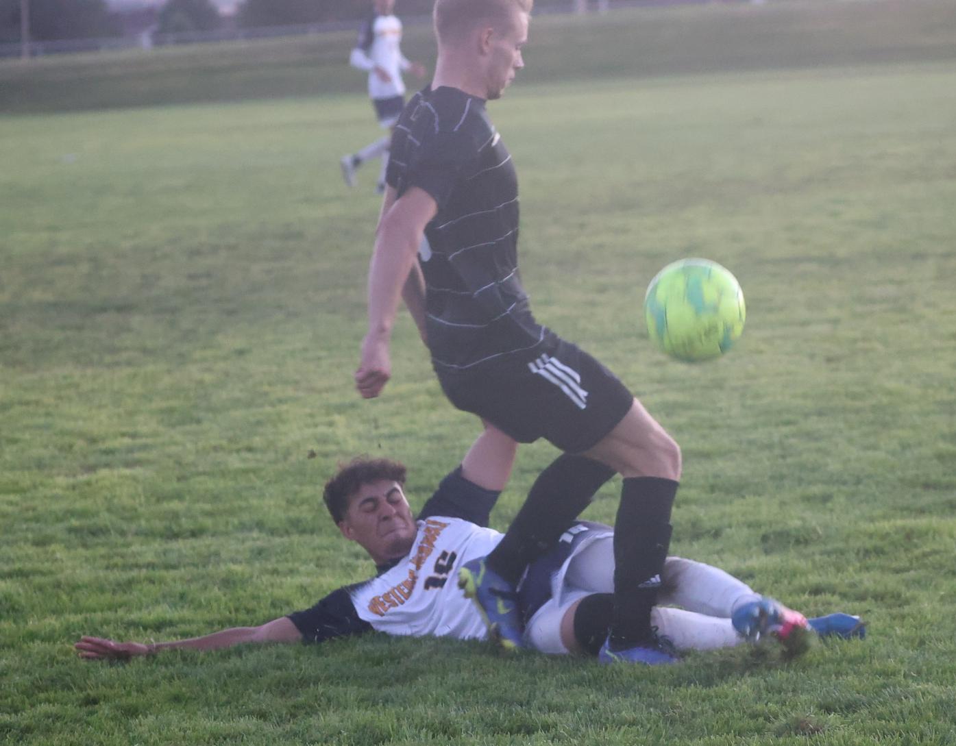 Sliding in to defend.