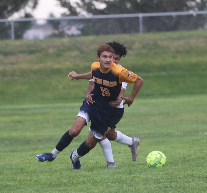 Cougar player getting held on a play.