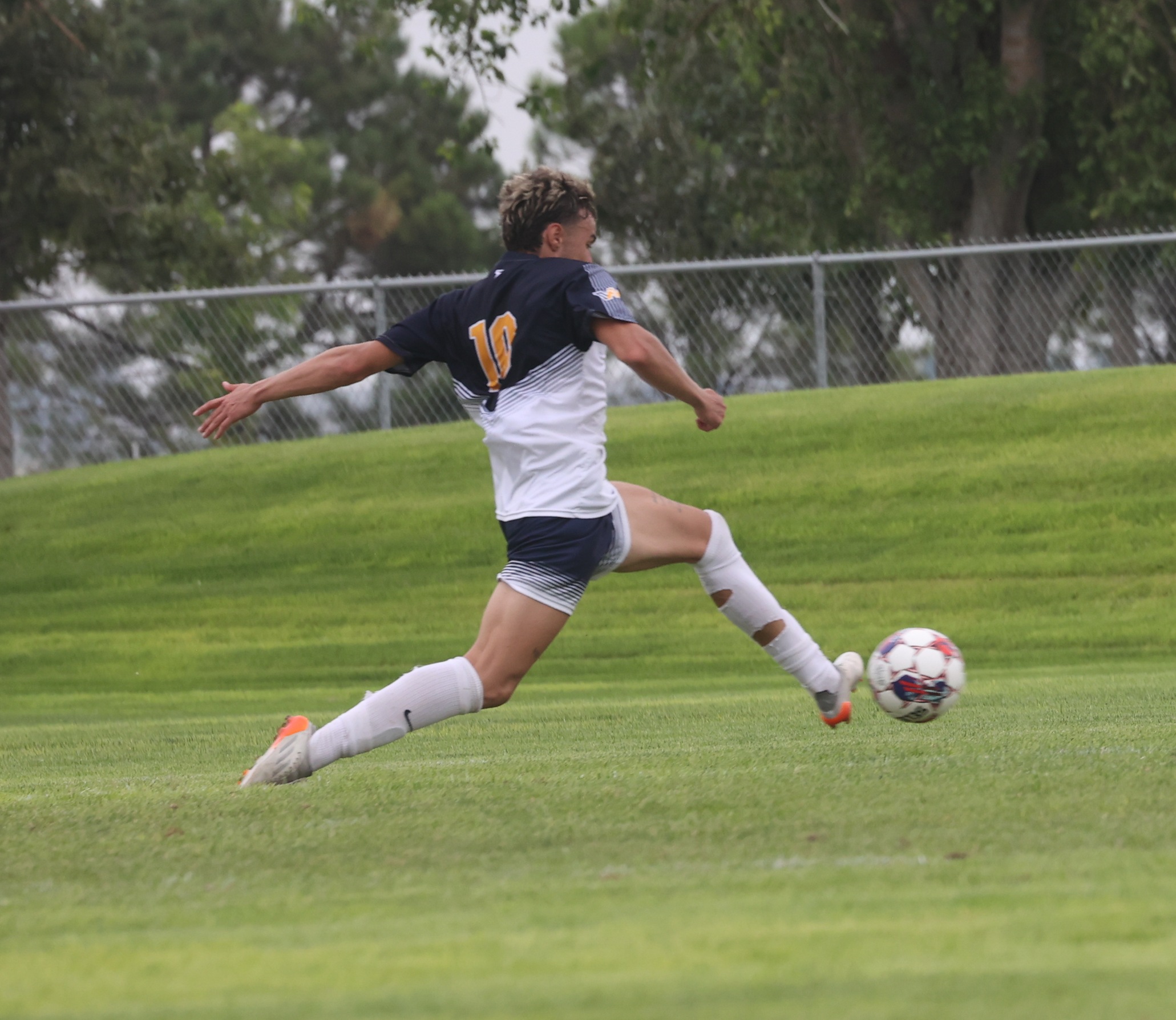 Eduardo Oliveira scores a goal against Utah State Eastern back in August.