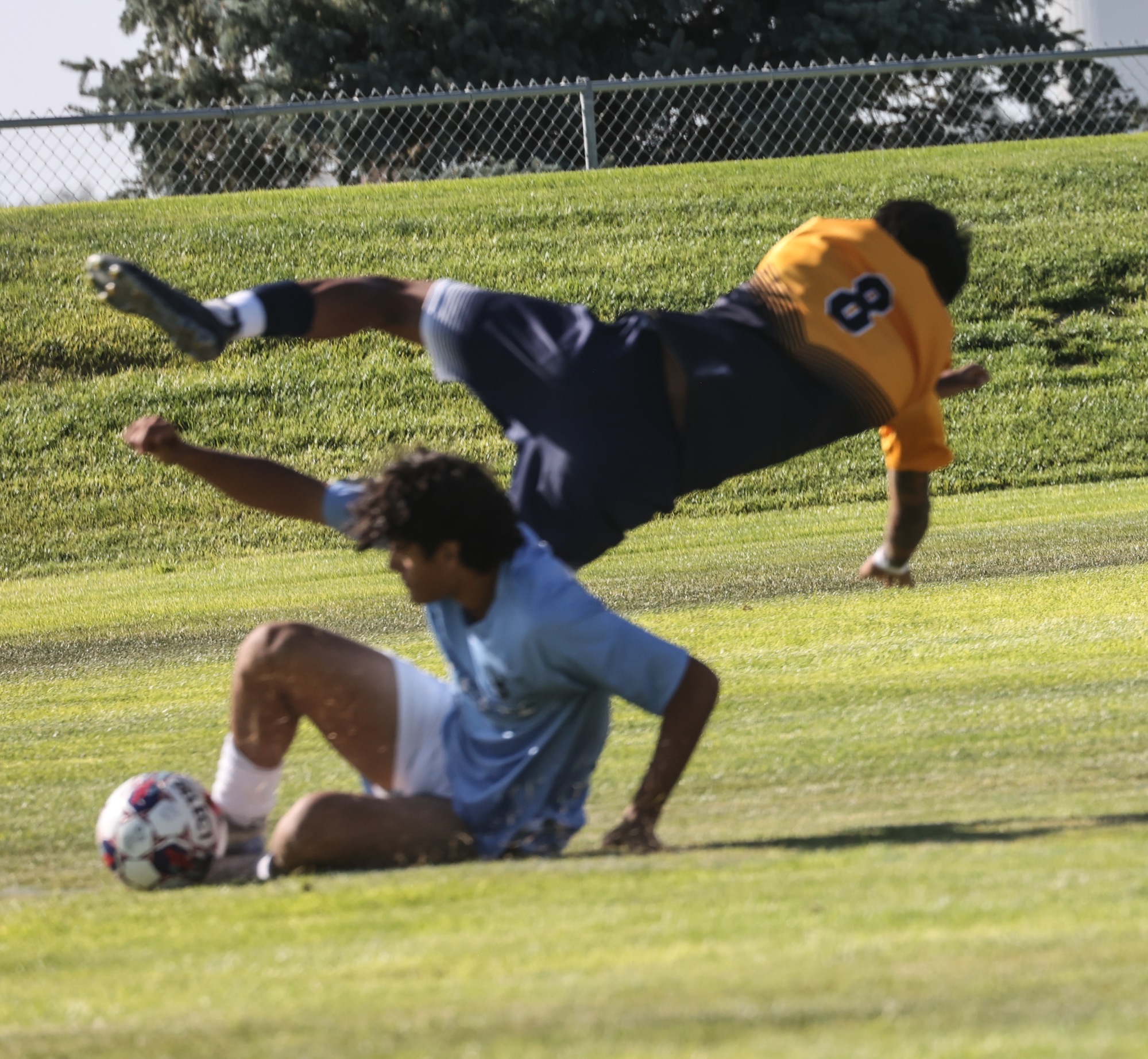 WNCC's Lucas Ovalle gets goes airbourne after getting tackled by a Gillette player.