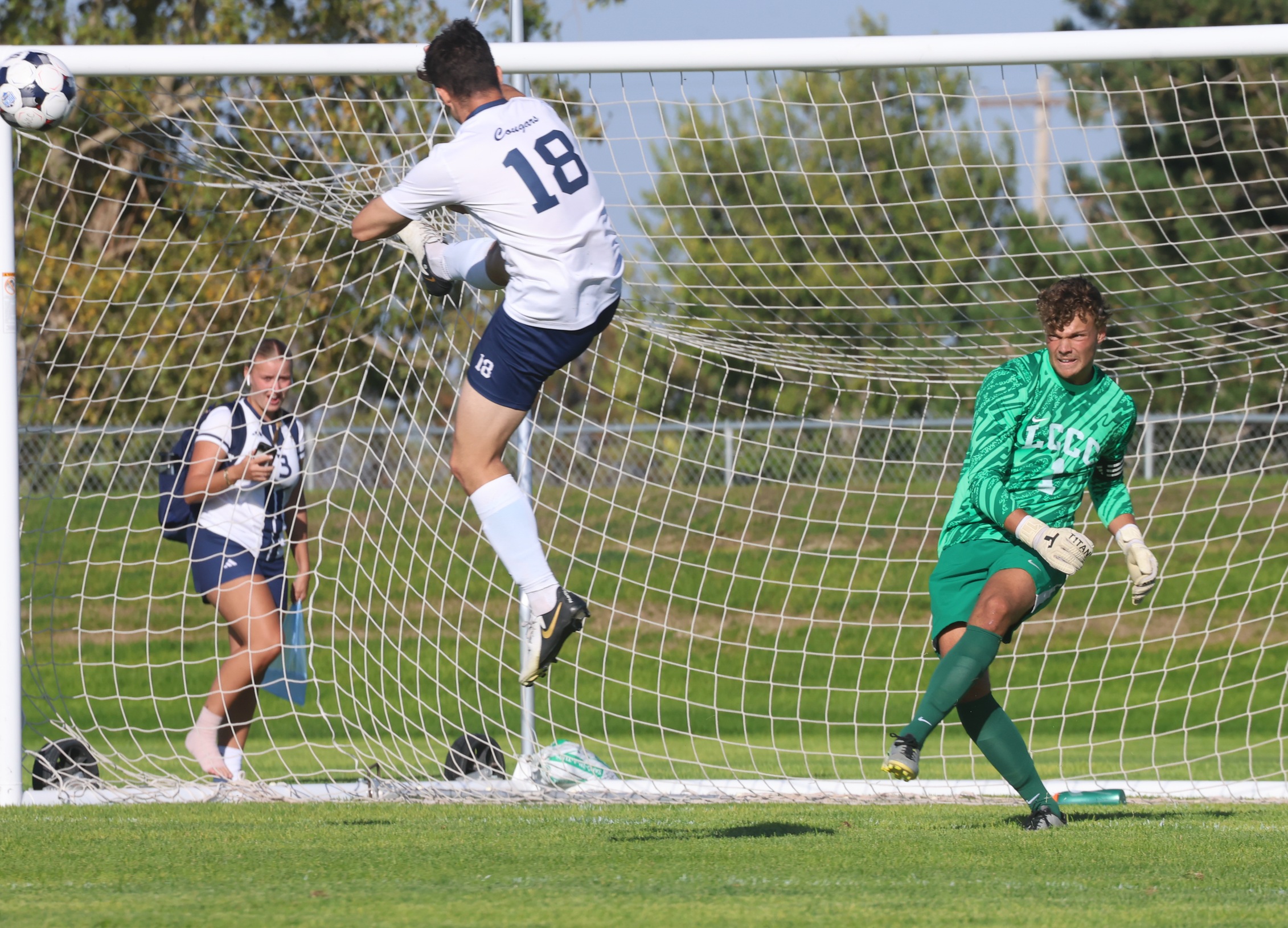 Pau Vera Montoya goes high and deflects the LCCC goalkeeper's kick back toward the goal. WNCC and LCCC tied 2-2.