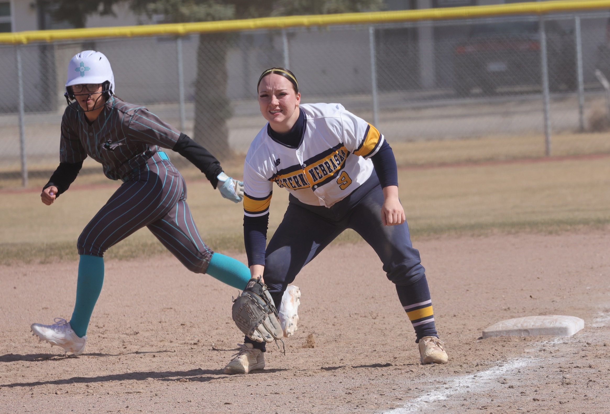 Gracie Holm gets ready for defense at first base in the Cougars first game with Luna on Sunday.