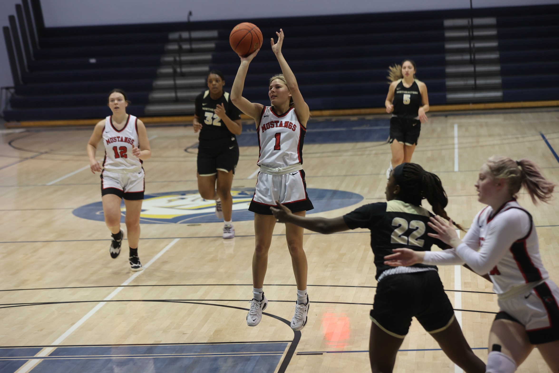 Photo of a Western Wyoming player shooting against NJC.