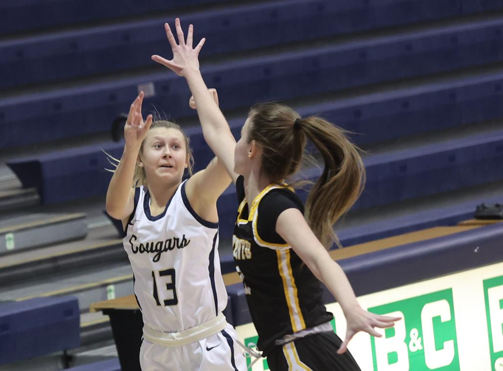 Bre Fowler shoots a 3-pointer.