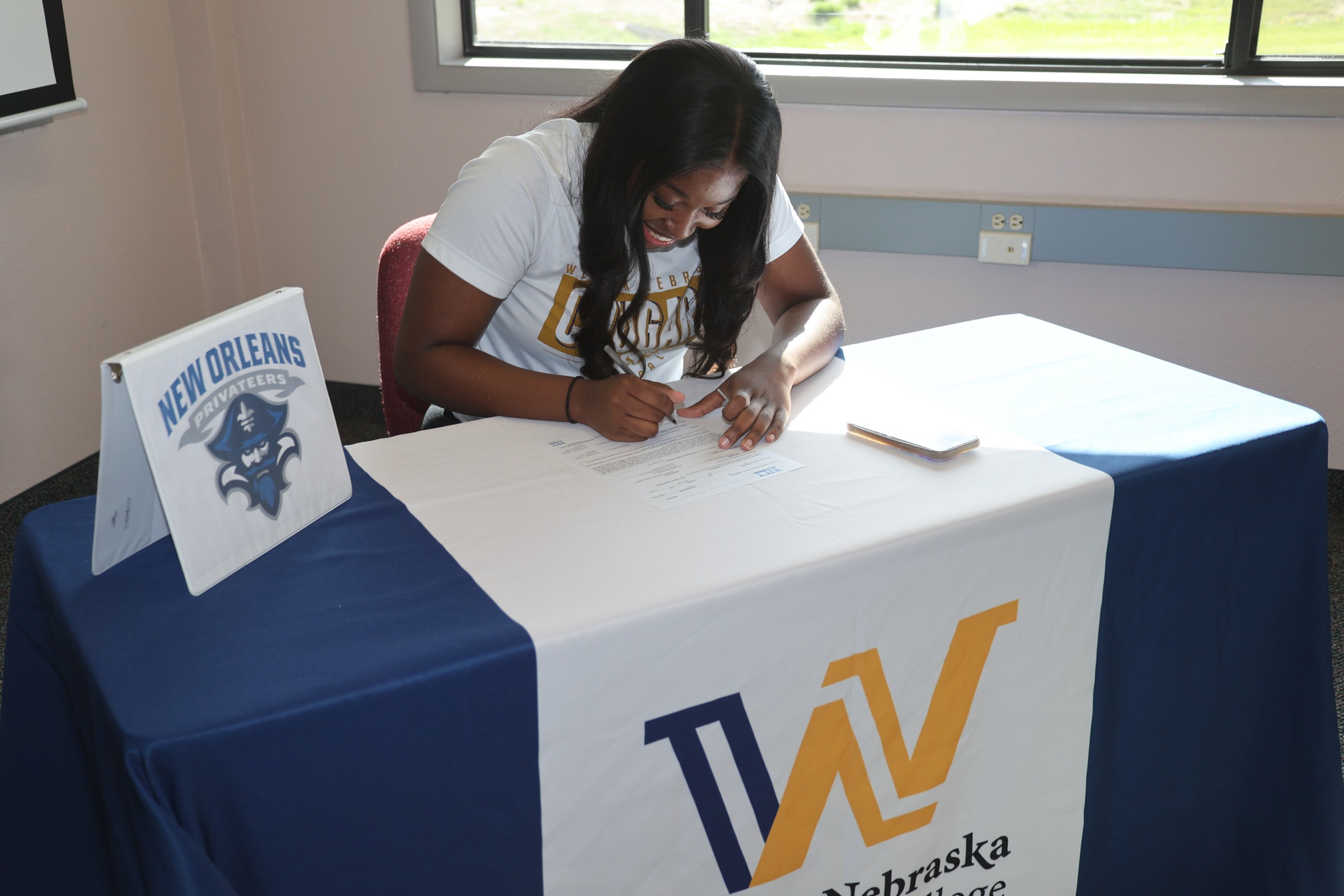 Mackenzie Joseph signs with the University of New Orleans.