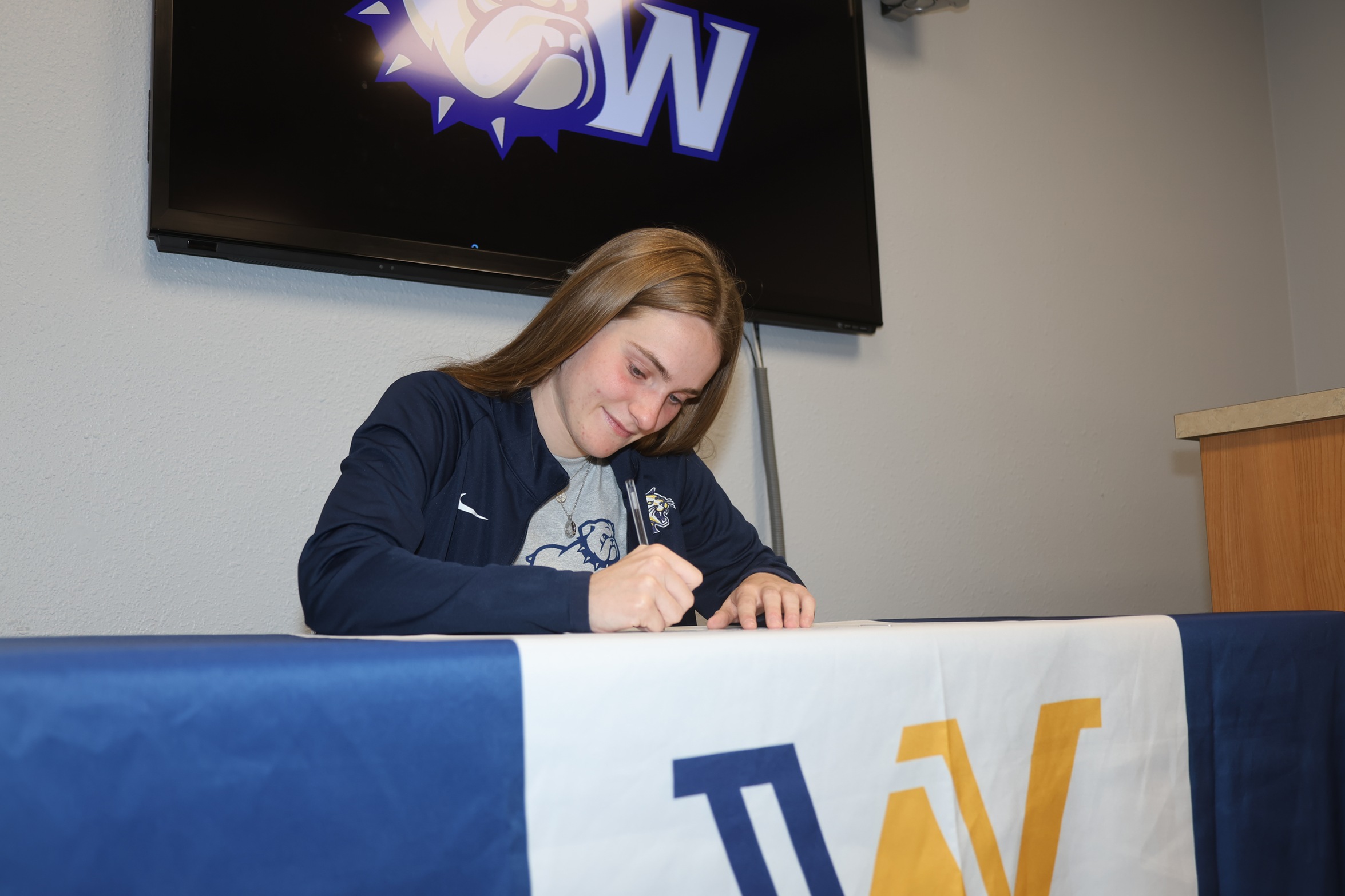 Laura Montiel signing to continue playing at Wingate University in North Carolina on Friday.