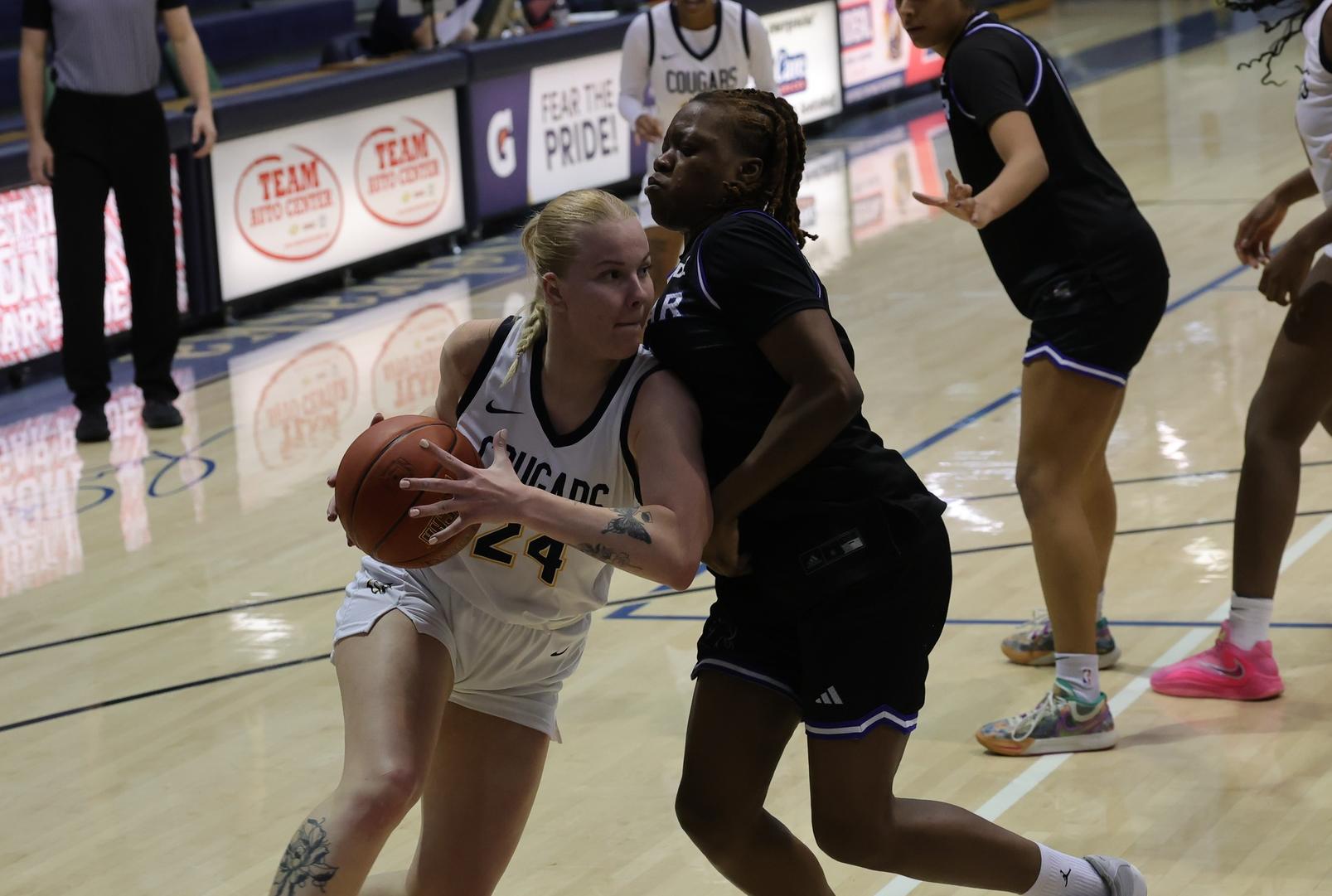 Zozefine Sipolina drives the to the bucket in their game with Lamar on Wednesday.