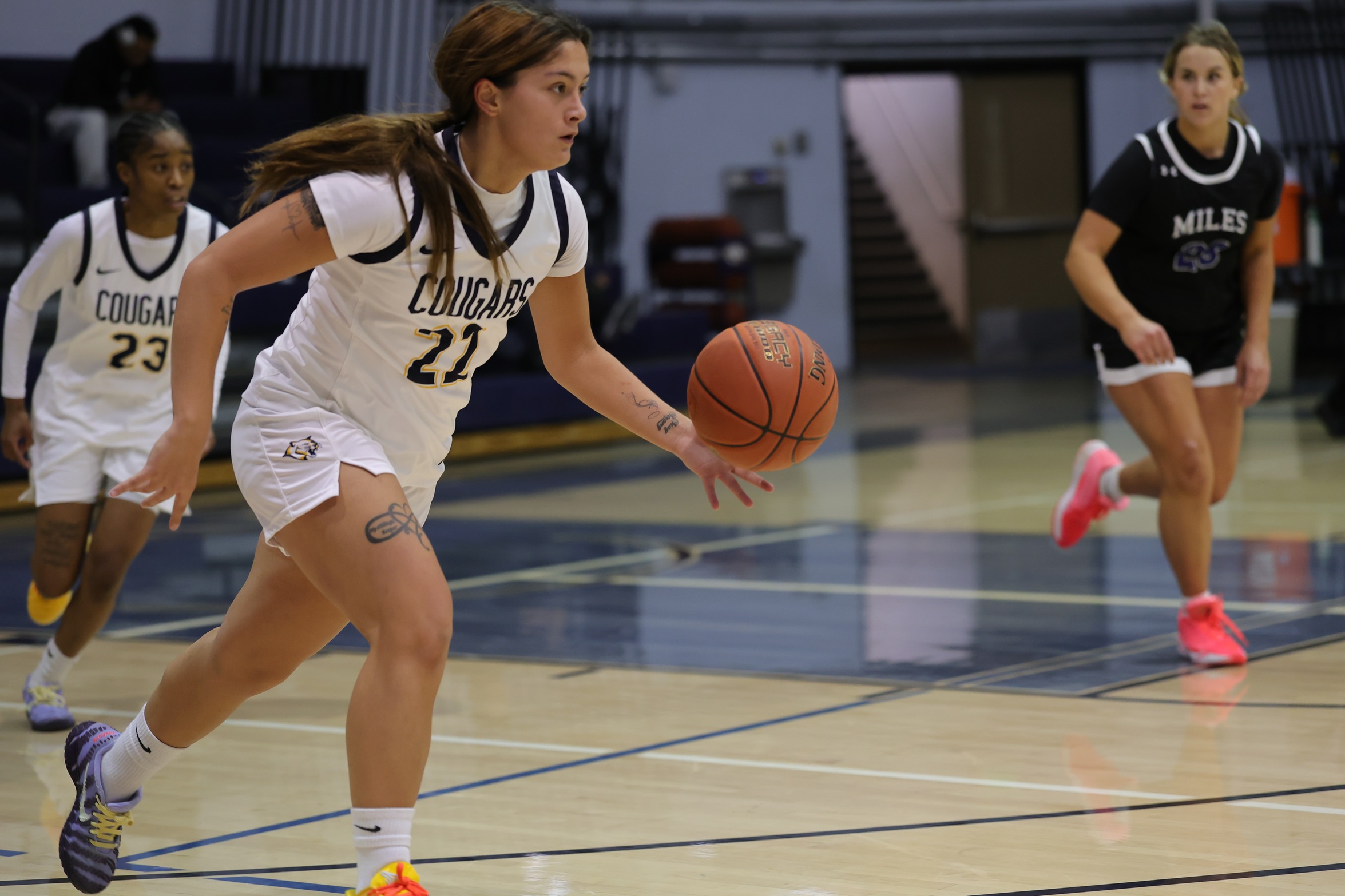 WNCC's Veralyn Aviles brings the ball up the court in the second quarter. of a game played in November.