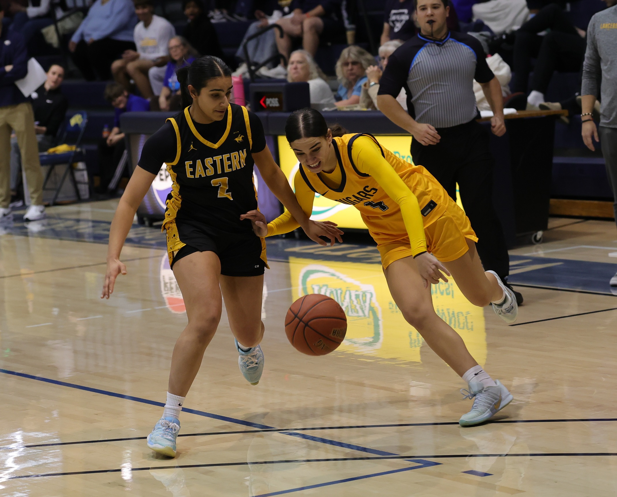 Juseana-Rae Delatori drives to the bucket against EWC before Thanksgiving.