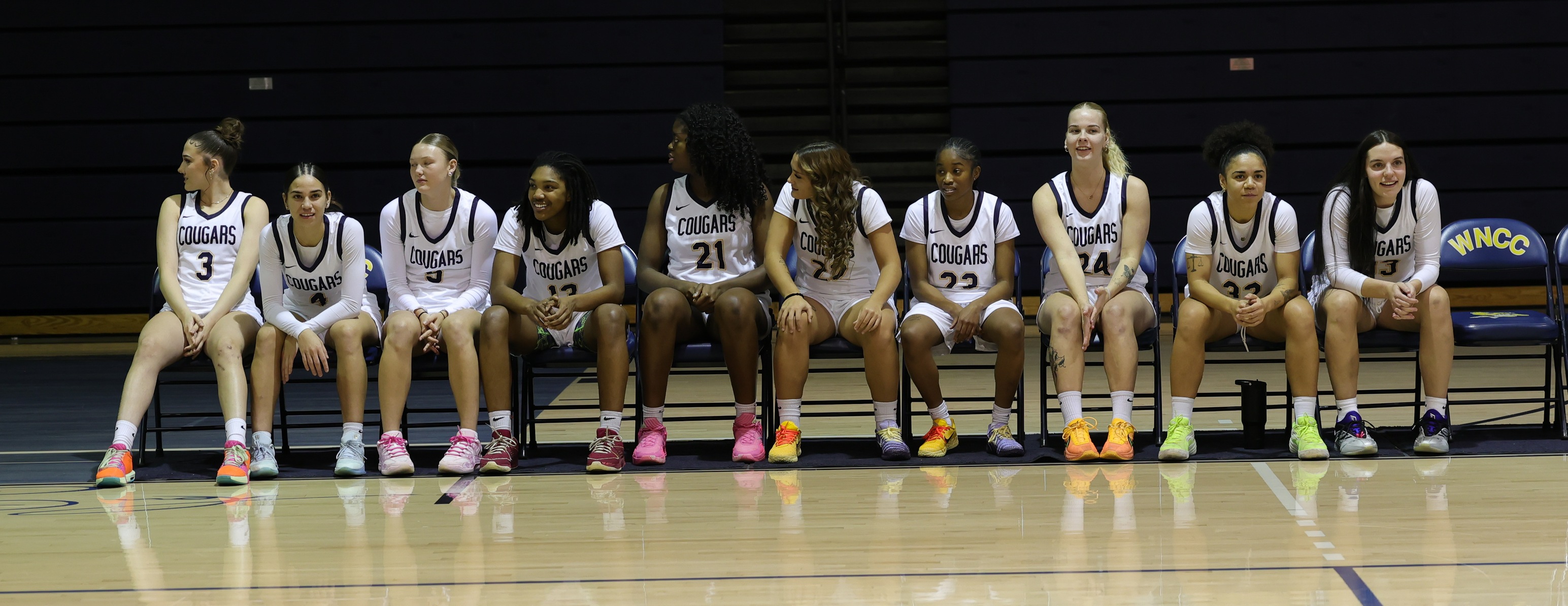 The women's basketball team after they were introduced on Cougar Madness night on Oct. 22. The Cougars open the season Halloween night.