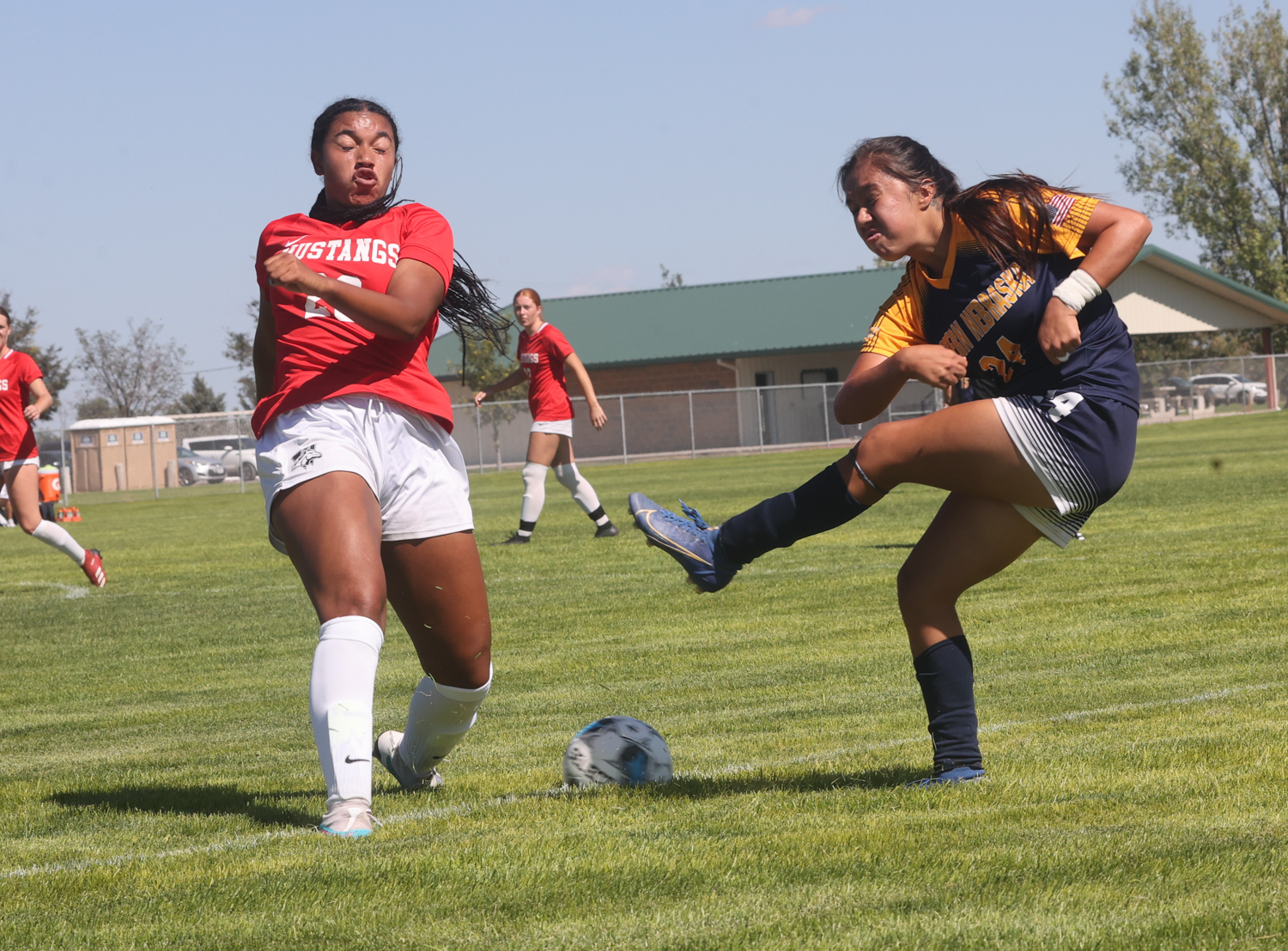 Tania Razo takes a shot on goal.