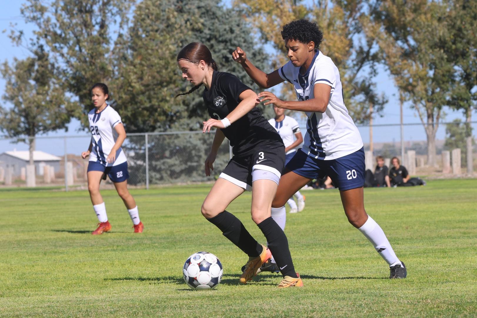 WNCC's Camilla Emanuelle de Souza controls the ball in front of a Barton player on Tuesday.