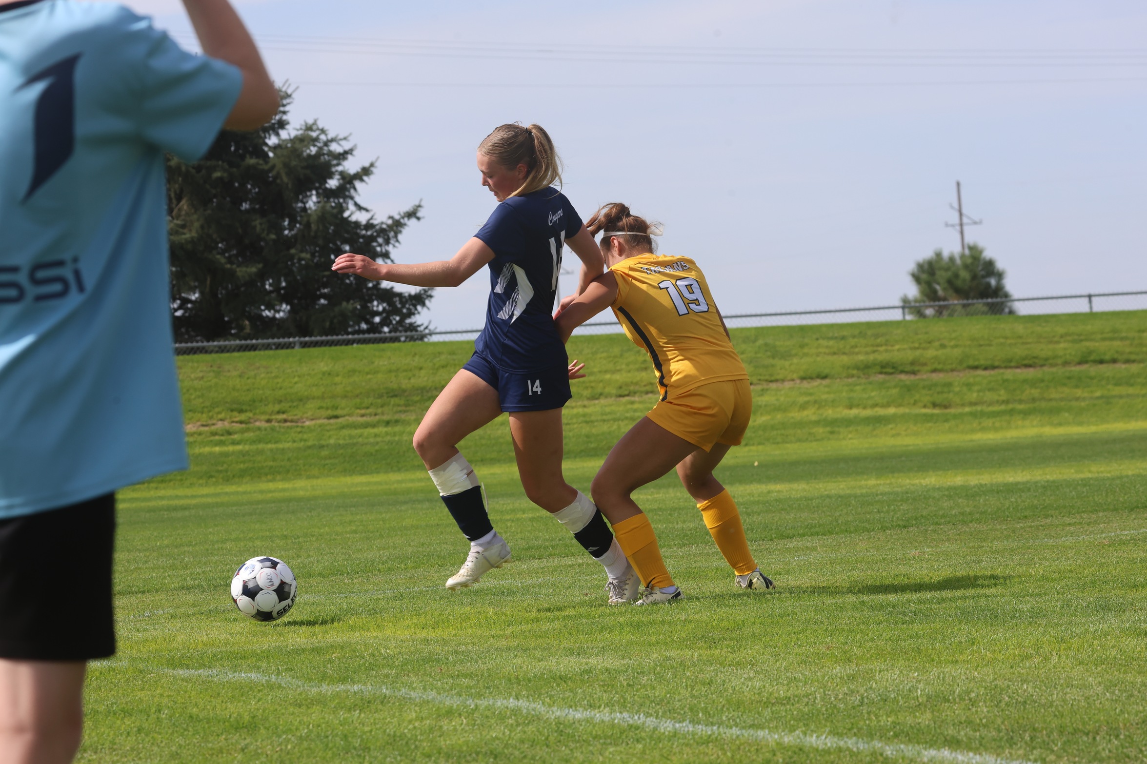 WNCC's Marit Schelistraete goes after the ball against a Trinidad player on Saturday.