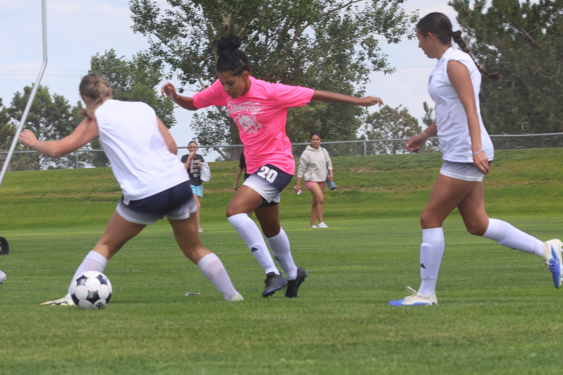 Women in action during their scrimmage.