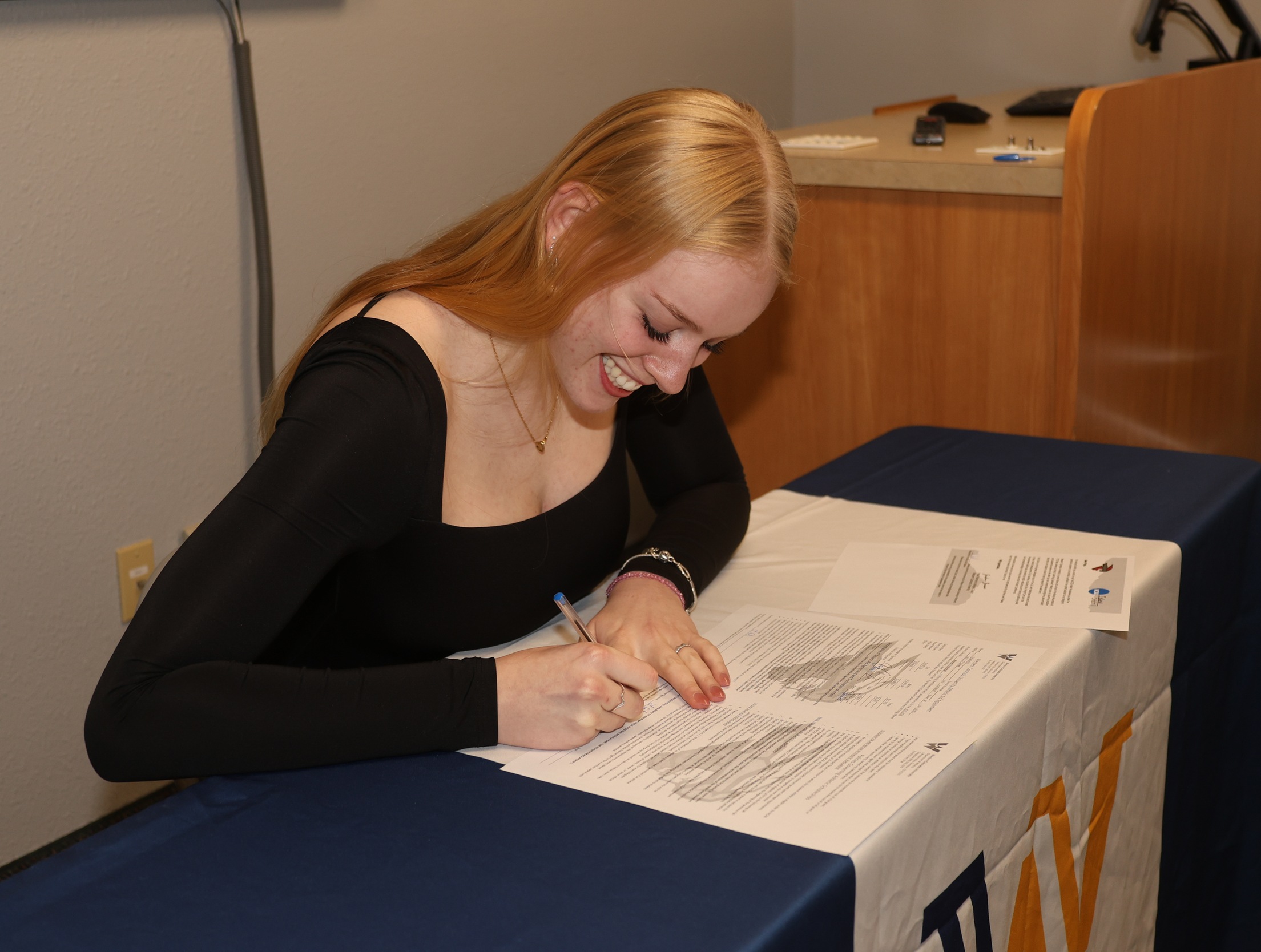 Finja Schul signs to continue her playing at the 4-year level, signing Friday with Western Colorado University.