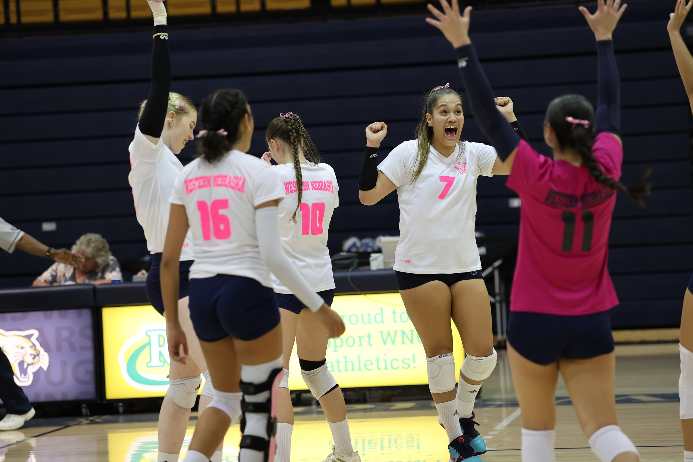 WNCC players celebrate a point in the match with North Platte.