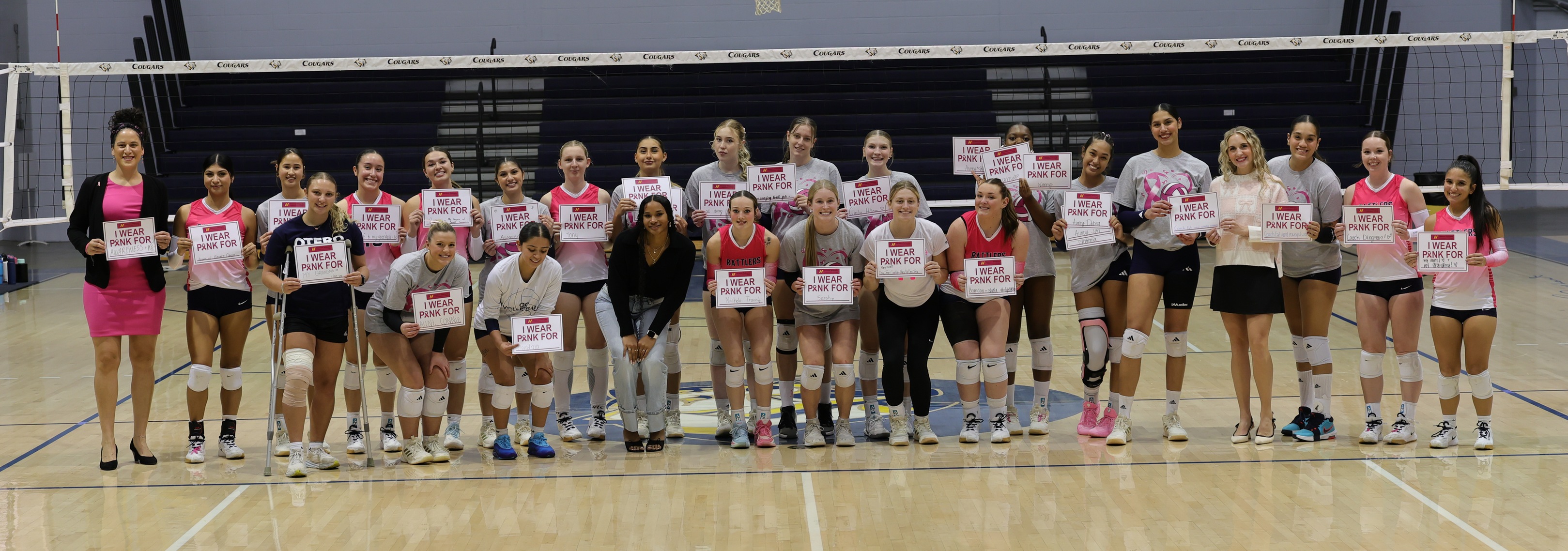 WNCC team photos with Otero during the Breast Cancer Awareness night.
