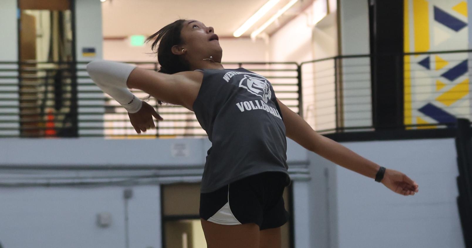 Kyana Gabriel hits in a practice earlier this season.